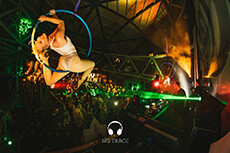 Aerial hoop performer overlooks the crowd