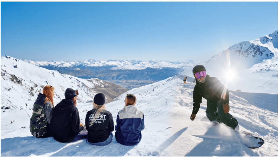 snowboarding on Queenstown mountain slopes