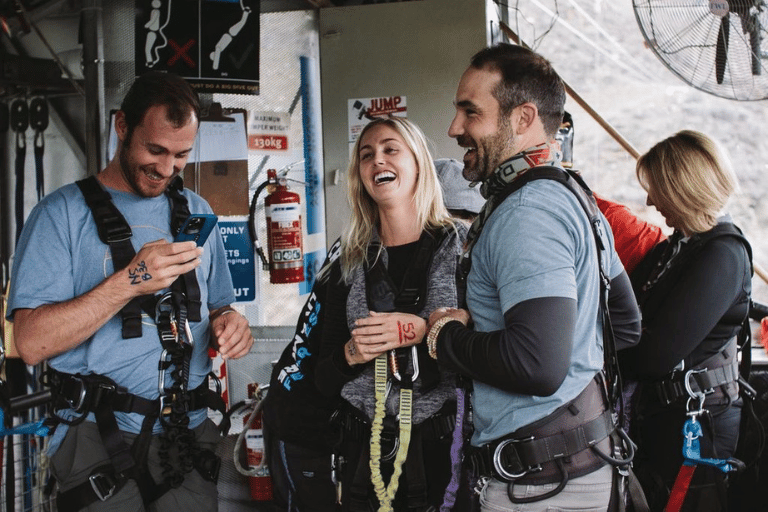 jumpers laughing with bungy crew